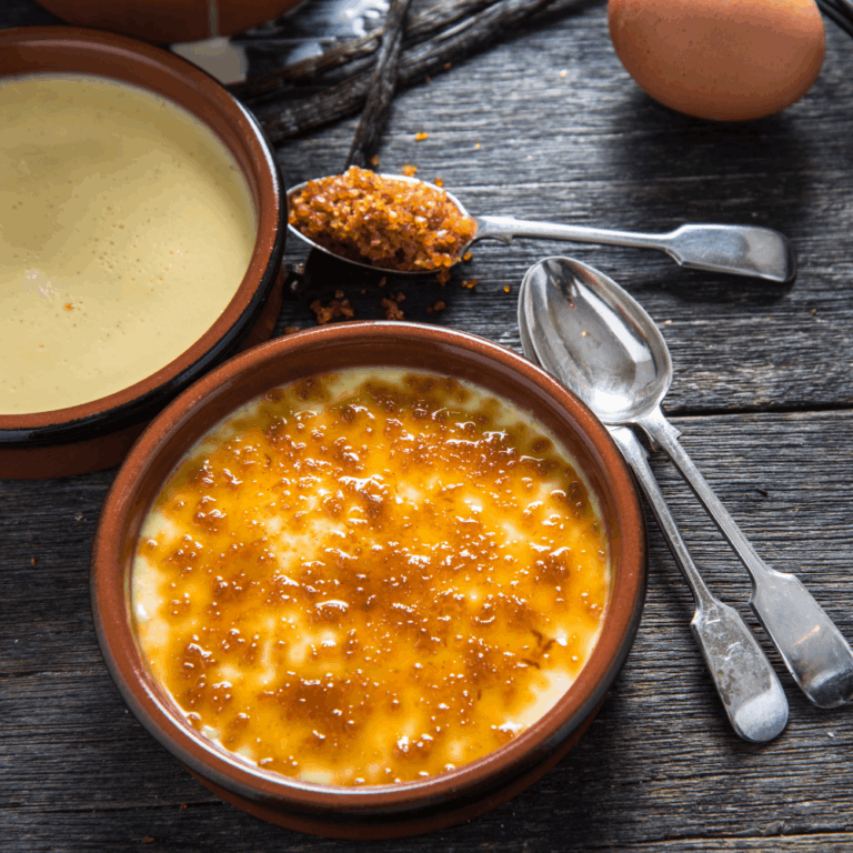 Classic French crème brûlée with caramelised sugar topping served in a ramekin tapas dish