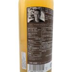 Back view of a 330 ml bottle of Alain Milliat Passe Crassane Pear Juice, showing the nutrition facts panel and product information on a white background.
