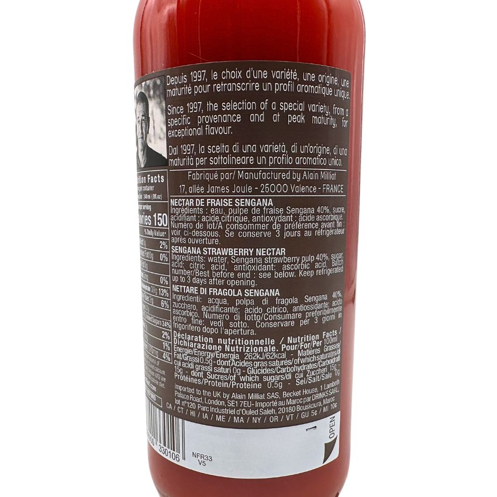 Back view of a 330 ml bottle of Alain Milliat Strawberry Nectar, showing the ingredients and product information label on a white background.