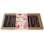 Maison Pécou Orangettes with candied orange peel coated in dark chocolate, presented in gift packaging.