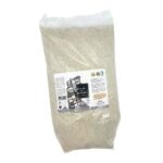 Front of a 5kg bag of TradySel Guérande coarse Celtic sea salt with a central product label on a large clear plastic bag filled with coarse grey sea salt.